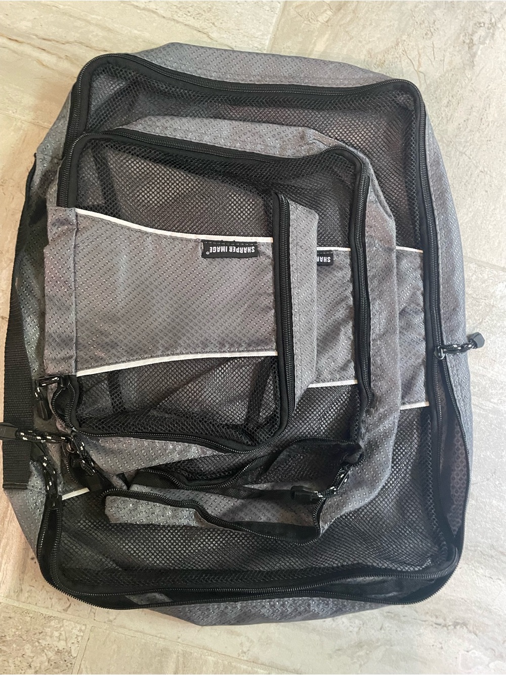 Set of three sharper image, travel, packing cubes, Gray and Black